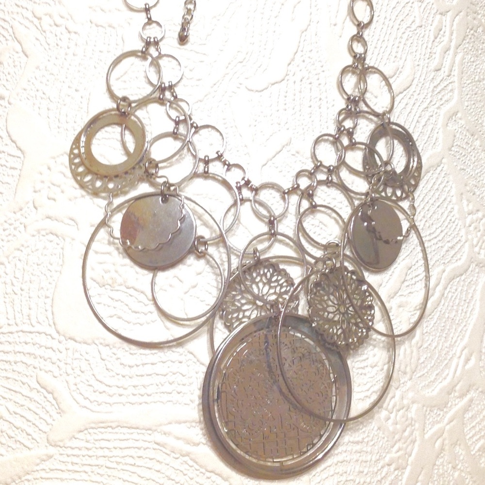 Mult-Ring Dangle Necklace.Bright Shiny Silver Tone